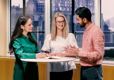 Three People In A Meeting
